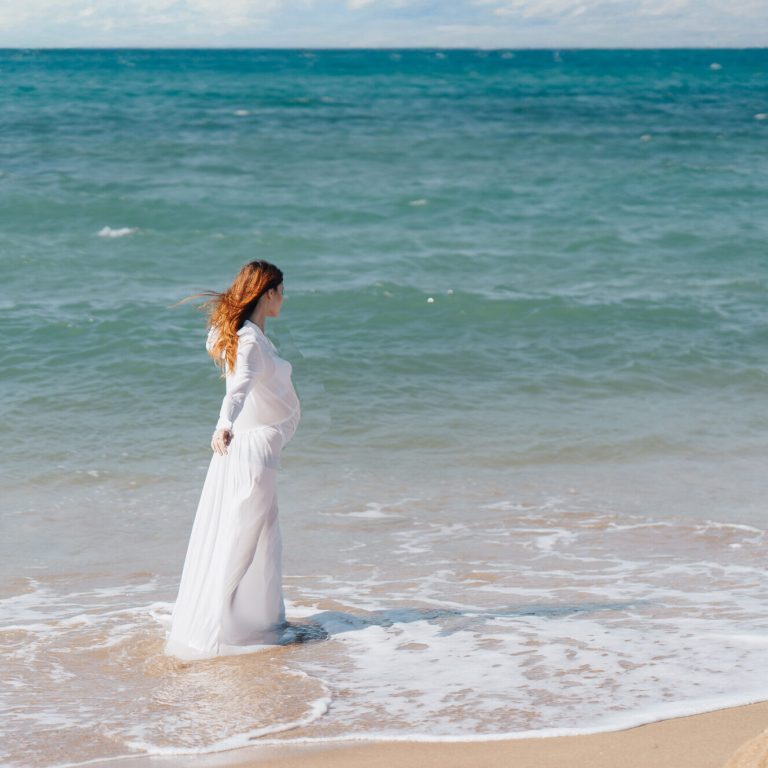 pretty woman white dress walk beach freedom Lifestyle. High quality photo